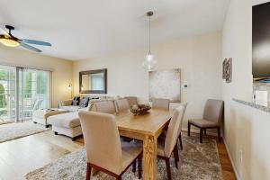 a living room with a table and a couch at Rehoboth Crossing --- 36985 Grindstone Ln in Rehoboth Beach