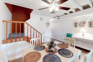 a dining room with a table and some chairs at Mallard Lakes -- 38243 Cardinal #115 in Selbyville