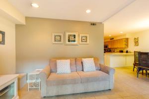 a living room with a couch and a kitchen at Sea Colony - 1804 Doubles in Bethany Beach