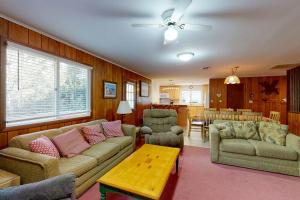 a living room with a couch and chairs and a table at Sea Del Estates - 38 Sugar Hill in Bethany Beach