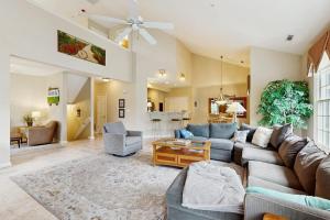 a living room with a couch and a table at Bear Trap Dunes - 1D Clubhouse in Ocean View