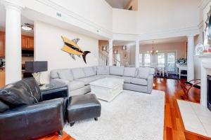 a living room with a couch and a table at Sea Colony - 56032 Great Pine in Bethany Beach