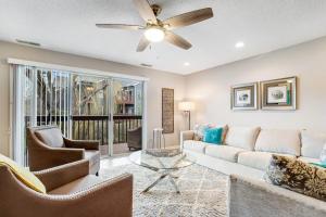 a living room with a couch and chairs and a ceiling fan at Eagles Landing I --- 260 Sea Eagle Dr Unit 7 in Rehoboth Beach