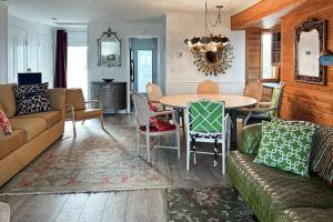 a living room with a couch and a table at Lewes --- 6 Pilot Point in Lewes