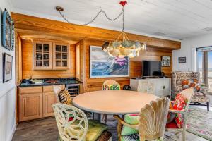 a dining room with a table and chairs at Lewes --- 6 Pilot Point in Lewes