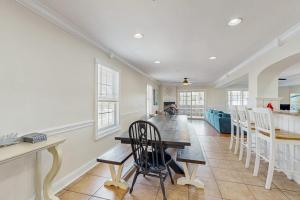 a kitchen and dining room with a table and chairs at Edgewater Acres --- 39157 Garfield Ave in Selbyville +45 photos