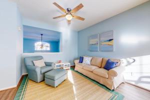 a living room with a couch and a ceiling fan at Bayside at Bethany Lakes #143 in Ocean View