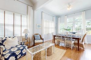 a living room with a couch and a table at Bear Trap Dunes --- 34 Sycamore Street in Ocean View