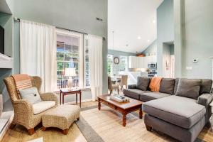 a living room with a couch and chairs and a table at Bear Trap Dunes 16 Sycamore St in Ocean View