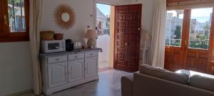 Cuina o zona de cuina de Apartamento Veranea, Vera Playa 29 fotos més