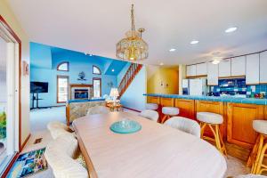 a kitchen and dining room with a table and chairs at South Bethany --- 301 W 2nd St in Bethany Beach +36 photos