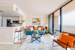a living room with a couch and a table at Sea Colony - 708 Brandywine House in Bethany Beach