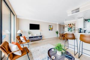 an open living room with a kitchen and a living room at Sea Colony - 708 Brandywine House in Bethany Beach +42 photos
