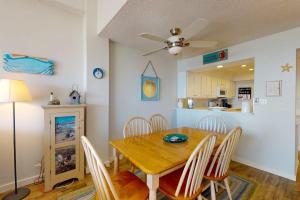a dining room with a table with chairs and a ceiling fan at Sea Colony - 2F Brandywine Garden Rd in Bethany Beach