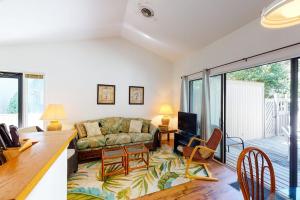 a living room with a couch and a table at Sea Colony - 4003 Volley in Bethany Beach