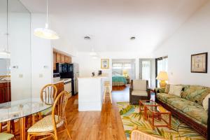 a kitchen and living room with a couch and a table at Sea Colony - 4003 Volley in Bethany Beach