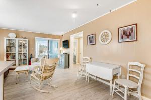 a kitchen and dining room with a table and chairs at Bethany Meadows - 2A Briar North in Frankford +20 photos