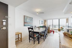 a kitchen and dining room with a table and chairs at Sea Colony - 507 Georgetown House in Bethany Beach