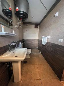 a bathroom with a sink and a toilet at khofo pyramids view in Cairo +60 photos