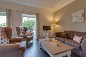 TV a/nebo společenská místnost v ubytování B&B vakantieappartementen Dalerheugte