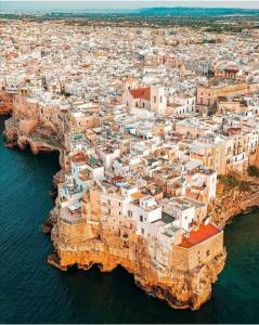 an aerial view of a village on the cliffs at Casa Nannì in Polignano a Mare