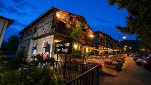 a building with a sign that says music hall so jazz at Hostal San Blas in La Alberca