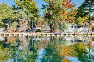 a view of a lake with a dock at Battersea on the Canal in Ocean Pines