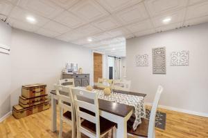 a dining room with a table and chairs at South Haven Retreat in South Haven