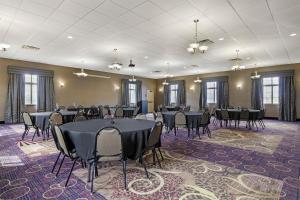 a large room with tables and chairs in it at Best Western Plover-Stevens Point Hotel & Conference Center in Plover +55 photos