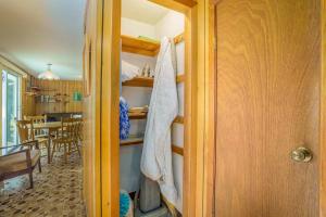 a room with a kitchen and a dining room at Grandma's Sandbox in Beulah +23 photos