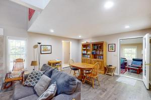a living room with a couch and a table at Lou n' Lil's in Glen Arbor +23 photos