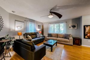 a living room with a couch and a table at Seafarer 7 in Ocean Pines