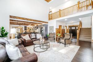 a living room with a couch and a table at Buckaroo in Thompsonville