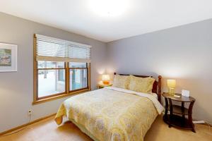 a bedroom with a bed and a window at Crystal Haven in Thompsonville +18 photos