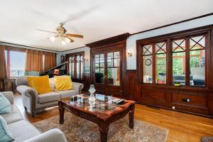 a living room with a couch and a coffee table at Lake Michigan Retreat- Upper Duplex in Benton Harbor