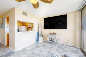 a living room with a large flat screen tv on the wall at Sea Colony --- 1BB Brandywine Garden in Bethany Beach
