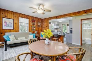 a kitchen and living room with a table and chairs at Lake Michigan Charmer in Union Pier