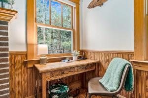 a home office with a desk and a window at Cedar Nook in Arcadia +20 photos