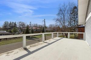 a balcony with a white railing on a house at Beacon Court D in Douglas