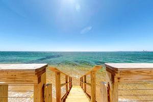 a view of the ocean from a wooden pier at Nautical Haven at Seaside in North Truro