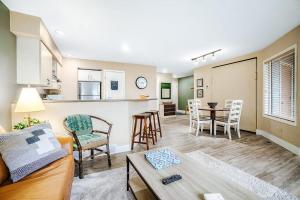a living room with a couch and a table at Wintergreen Condo, Unit 540 in Thompsonville
