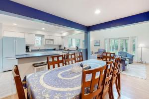 a kitchen and dining room with a table and chairs at Sea Colony - 56010 Pine Shore in Bethany Beach