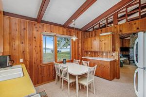a kitchen with a table and chairs in a room at Camp David in Frankfort +21 photos