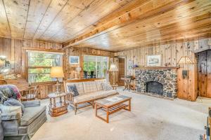 a living room with a couch and a fireplace at Hal's Hideaway in Beulah