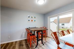 a dining room with a table and chairs at Mill Run Estates --- 31863 Mill Run Dr in Ocean View +21 photos