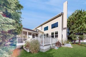 a white house with a porch and a yard at Wedgefield --- 23 Wedgefield in Ocean View