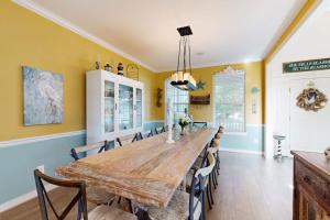 a dining room with a large wooden table and chairs at Wedgefield --- 23 Wedgefield in Ocean View