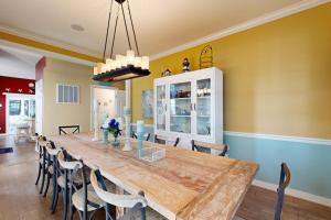 a dining room with a large wooden table and chairs at Wedgefield --- 23 Wedgefield in Ocean View