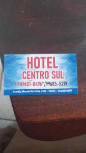 a sign on the side of a car at Hotel Centro Sul in Anastácio