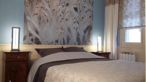 Postel nebo postele na pokoji v ubytování Commanderie Cottage Colmar